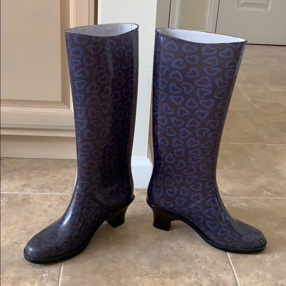 Rain boots tall rubber rarely used.